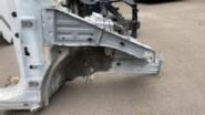 Hyundai Tucson TL передний правый лонжерон OEM 64511-D3050, Общий вид детали на стеллаже склада