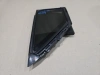 /upload/iblock/e36/4b6vn0c5bc1t81jj1vuftgxmy7ohp1lg.webp: Задняя левая форточка Toyota C-HR (OEM 68161-F4020) после очистки на столе осмотра